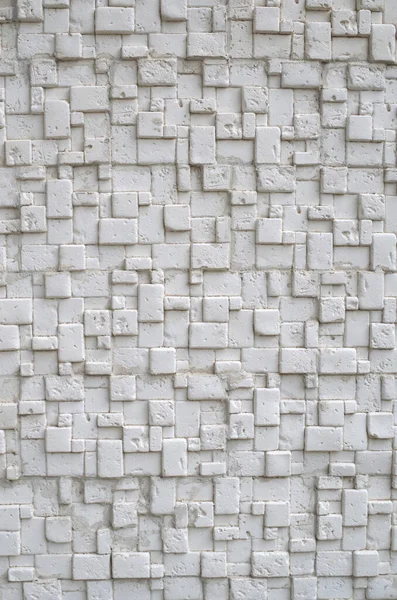 White Relief Tiles Imitating Stone Wall Closeu — Stock Photo, Image