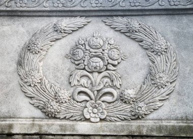 Medieval Turkish Art. Flowers carved on stone closeu