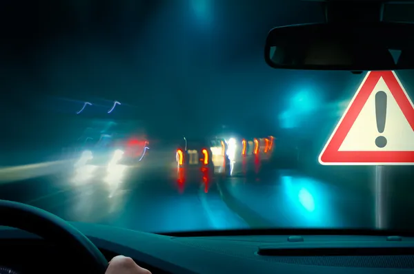 Bad weather driving - night driving - caution — Stock Photo, Image