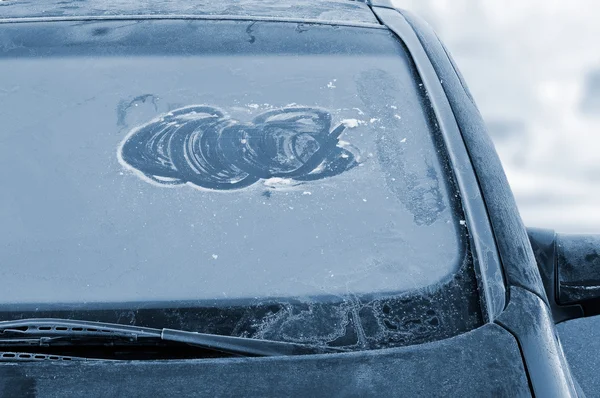 Winter driving - icy windshield — Stock Photo, Image