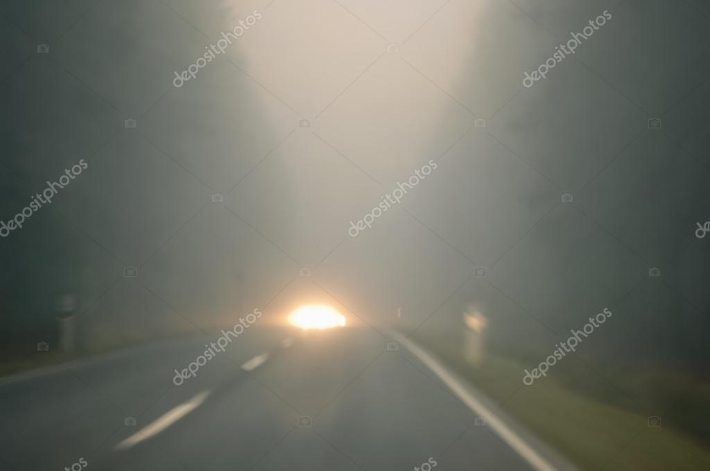 Bad weather driving country road caution fog — Stock Photo