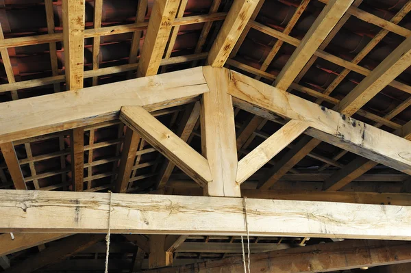 Inside the roof structure with wooden beams — Stock Photo, Image