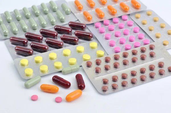 Pills and capsules in blister — Stock Photo, Image