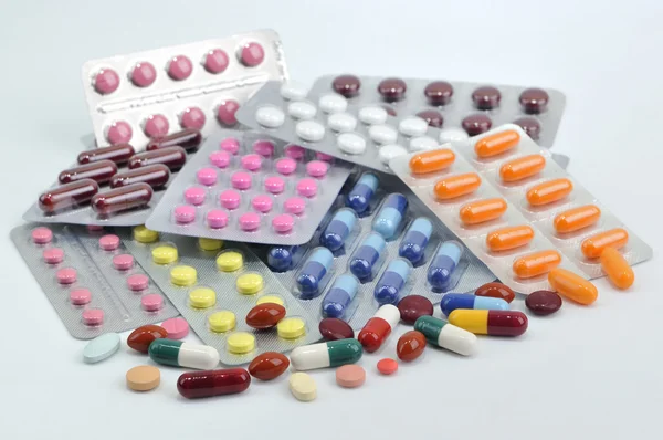 Pills and capsules in blister — Stock Photo, Image