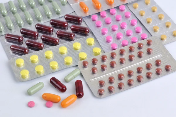 Pills and capsules in blister — Stock Photo, Image