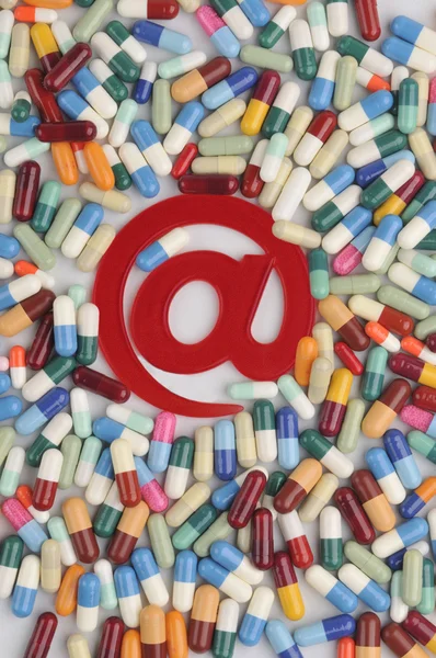 Pills with email symbol — Stock Photo, Image
