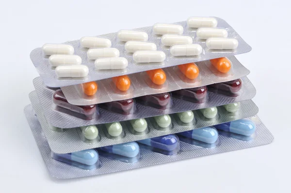 Pills and capsules in blister — Stock Photo, Image