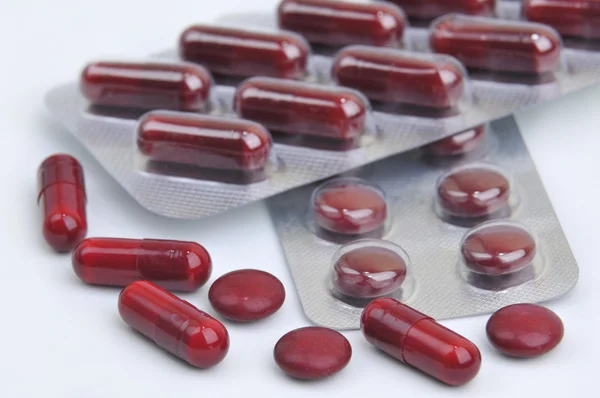 Pills and capsules in blister — Stock Photo, Image