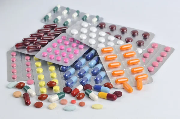 Pills and capsules in blister — Stock Photo, Image