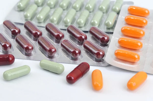 Pills and capsules in blister — Stock Photo, Image