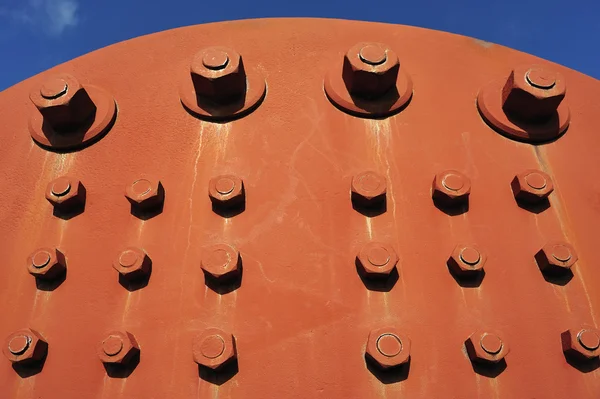 Textura de fondo maquinaria industrial pintada en rojo con hierro — Foto de Stock