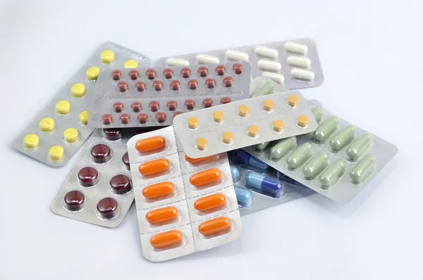 Pills and capsules in blister — Stock Photo, Image