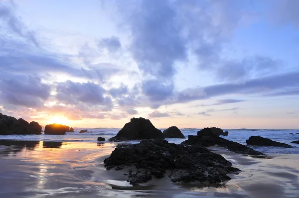 Sunset on a beach — Stock Photo, Image