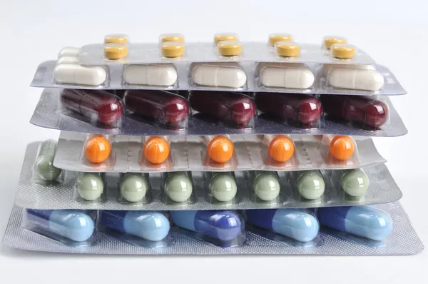 Pills and capsules in blister — Stock Photo, Image