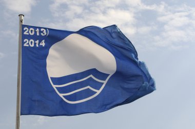 Blue flag that distinguishes european best beaches clipart