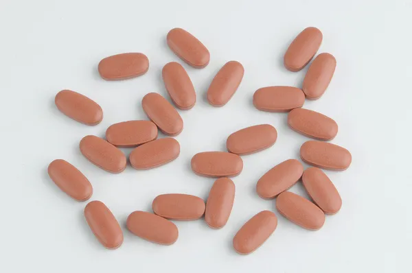 Brown pills and drugs — Stock Photo, Image