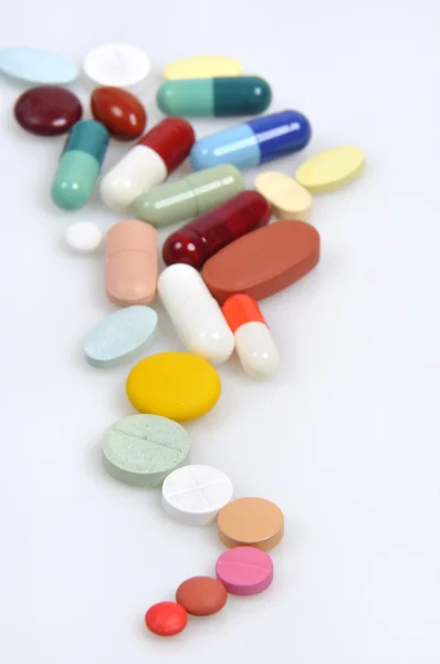 Sortimento de comprimidos e cápsulas — Fotografia de Stock