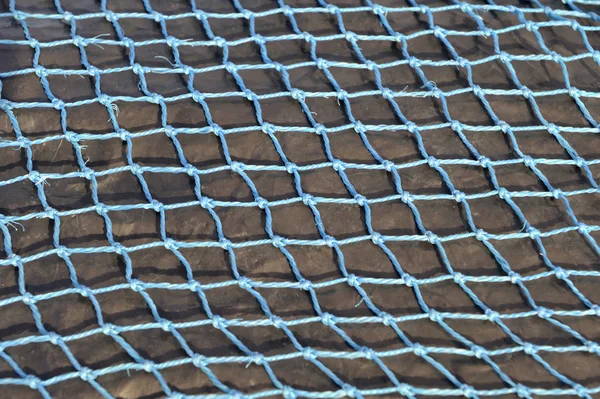 Template knotted nylon net fishing and patter — Stock Photo, Image