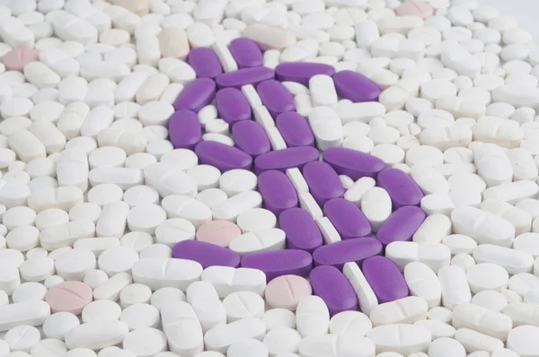 Pills and tablets with dollar symbol — Stock Photo, Image