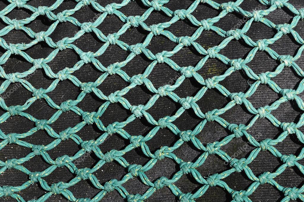 Template knotted nylon net fishing and patter Stock Photo by