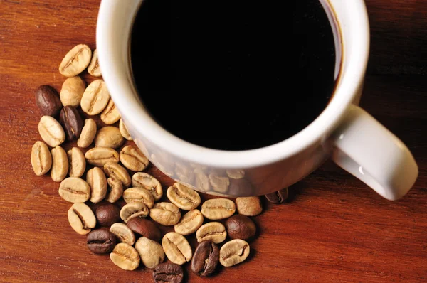 Tasse à café avec grains — Photo