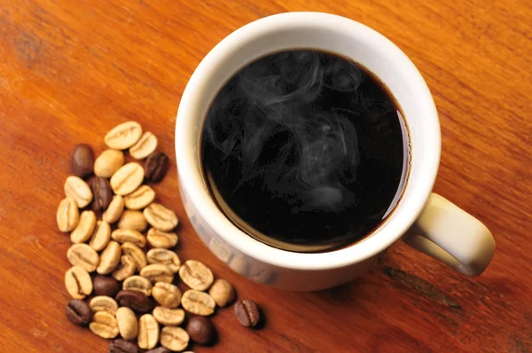 Tasse à café avec grains — Photo