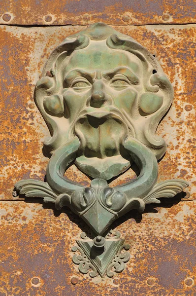 Bronze face knocker — Stock Photo, Image
