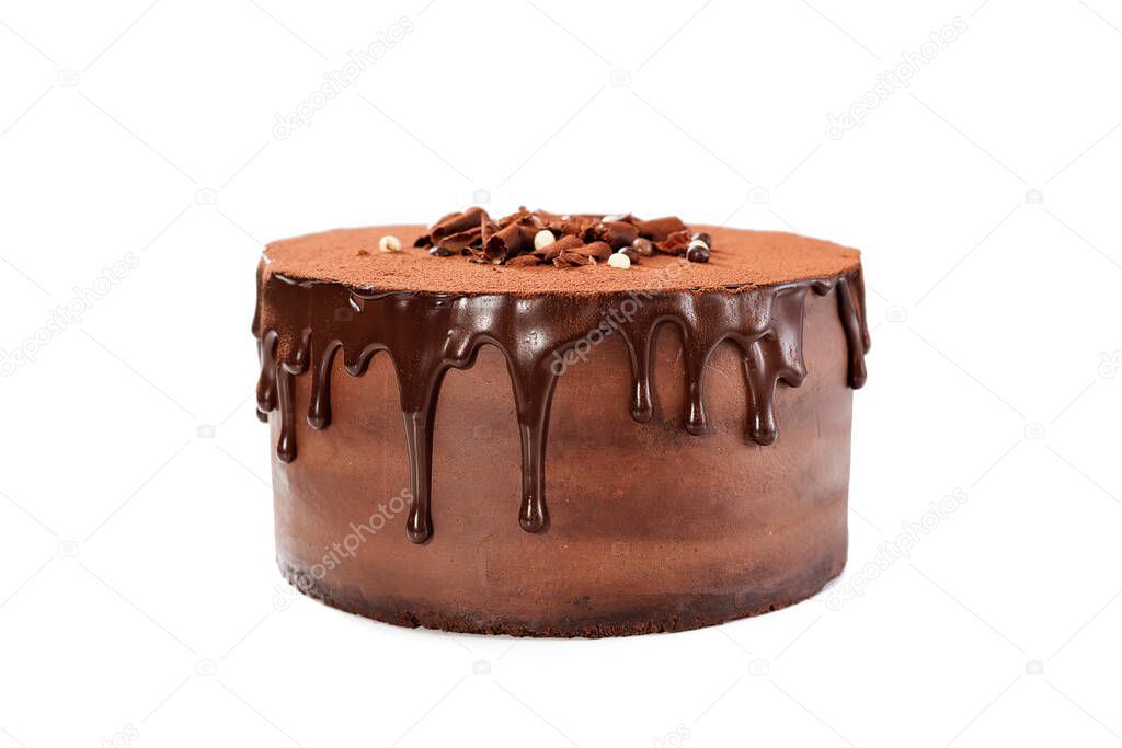 Super chocolatey cake  with dark Belgian chocolate  with ganache cream and chocolate glaze drips. Isolated on white background