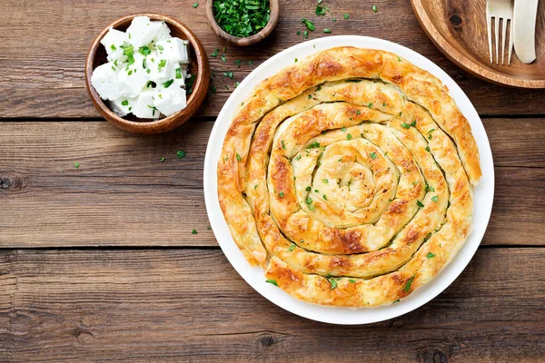 Traditional Feta Cheese Phyllo Pastry Pie Wooden Background — Zdjęcie stockowe