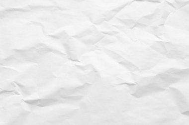 Buruşmuş kağıtlarla kaplanmış yaratıcı bir arka plan..