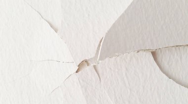 Cracked and obsolete gray wall.