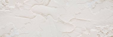 Cracked and obsolete gray wall.
