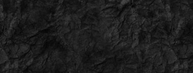 Buruşmuş kağıdın dağınık kaplamasına sahip yaratıcı bir arka plan.