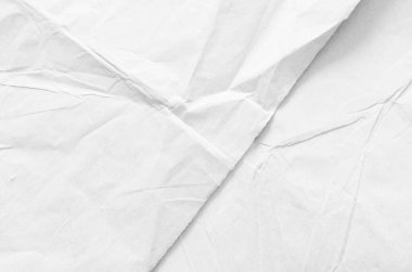 Buruşmuş kağıdın dağınık kaplamasına sahip yaratıcı bir arka plan.