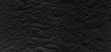 Arkaplanı buruşuk kağıtlarla kaplanmış..