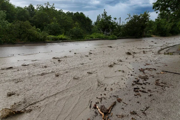 Destroyed Road Flood Mudflow Flowing Dirty Water Natural Disasters Concept — стоковое фото