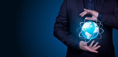 Communication technologies for internet business. Global world internet network. Businessman with protective hands gesture and earth neon ball. Copy space. High quality photo