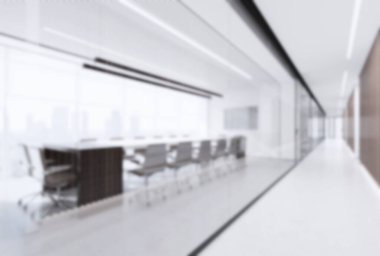 Bulanık bokeh efektli, parlak ışıklı bir ofis. Dikey fotoğraf. kopyalama alanı. Yüksek kalite fotoğraf