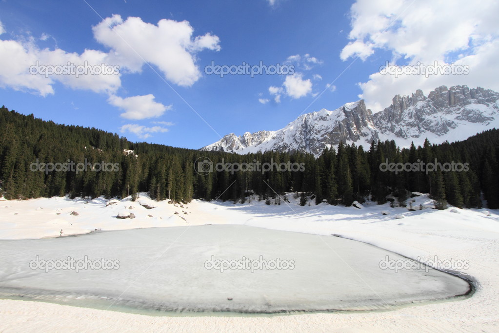 Dolomites alps and lake in winter