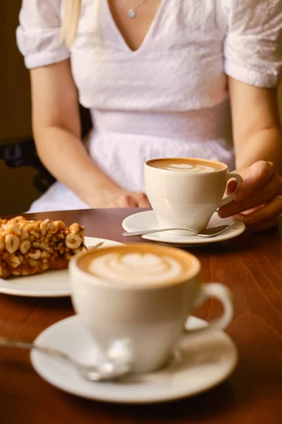 Woman Cup Aromatic Coffee Sweet Nut Cake Sits Cafe Restaurant — Stock Photo, Image