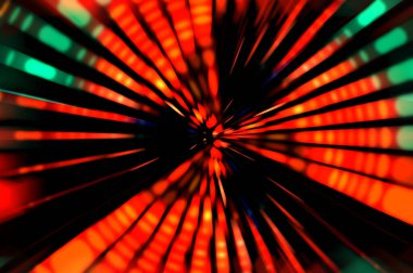 Siyah arkaplanda dönen ışık gösterisi. Lüks çizgiler. Parlak kıvrımlı duvar kağıdı. Uzay tüneli. Dönen ışık çemberi ya da maytap izi. Parlak konsept çizimi.