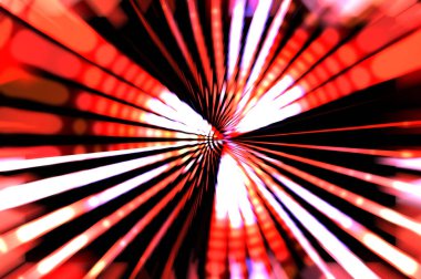 Siyah arkaplanda dönen ışık gösterisi. Lüks çizgiler. Parlak kıvrımlı duvar kağıdı. Uzay tüneli. Dönen ışık çemberi ya da maytap izi. Parlak konsept çizimi.