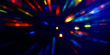 Parlayan ışıkları hareket ettirmenin havalı arka planı. Tasarımınız için canlı renkli bir portal şablonu. Işık ışınları ve hareket halindeki ışıldayan parçacıklar bir solucan deliği şekli oluşturuyor..