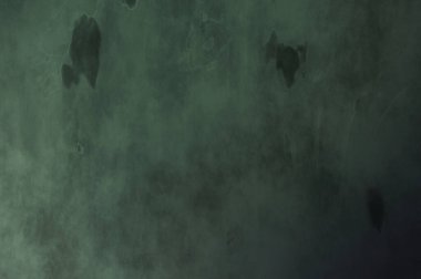 Gotik bir duvarda sıkıntılı ve kirli desenler var. Lekeli renkli hasarlı şablon. Tasarımınız için doku ve elementler. Pis duvar kâğıdı. Grunge arkaplanı.