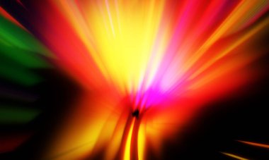 Siyah zemin üzerinde ışık parçacığı izleri. Parlayan parçacıkları ve çizgileri olan ışık patlaması yıldızı. Güzel hareketli soyut ışınlar duvar kağıdı. Renkli Patlama grafiği. Işık ışınlarının patlaması. 