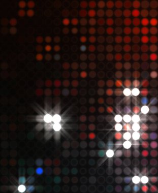 Parlak desenli duvar kağıdı. Sahne ışıkları olan renkli ışıkların ihtişamlı arkaplanı. Parlayan ışıklar siyah arka planda parti izleri. Sahne veya stadyum ışıklarının dijital illüstrasyonu. 