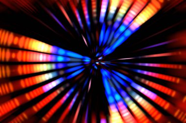 Siyah arkaplanda dönen ışık gösterisi. Lüks çizgiler. Parlak kıvrımlı duvar kağıdı. Uzay tüneli. Dönen ışık çemberi ya da maytap izi. Parlak konsept çizimi.