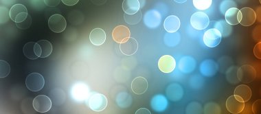 Kavramsal ışıklar duvar kağıdı. Güzel soyut çok renkli bokeh çemberleri parçacıklarla çevrili. Metninizi veya başlığınızı göstermek için boşluk ile odaklanmış olmayan canlı illüstrasyon. 