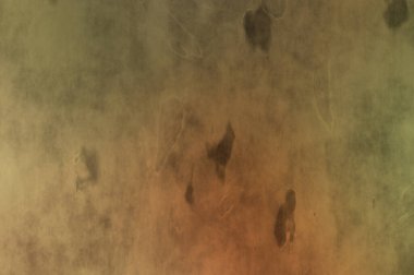 Gotik bir duvarda sıkıntılı ve kirli desenler var. Lekeli renkli hasarlı şablon. Tasarımınız için doku ve elementler. Pis duvar kâğıdı. Grunge arkaplanı.