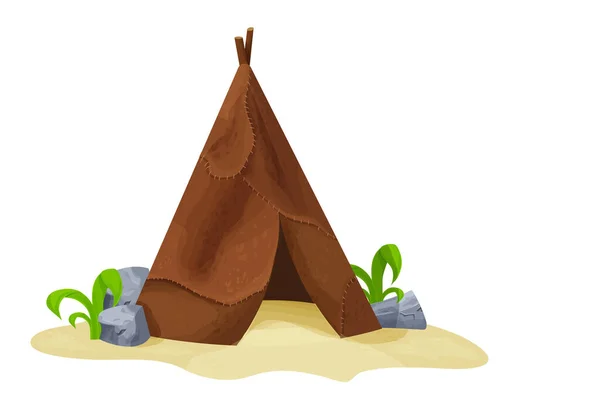 Prähistorische uralte Hütte aus Tierhaut mit Gras und Steinen im Cartoon-Stil isoliert auf weißem Hintergrund. Steinzeitkultur. Barbarenzelt. — Stockvektor